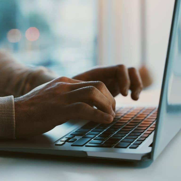 Businessman working on a laptop in an office