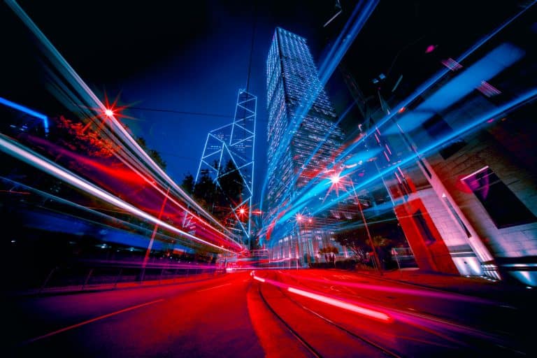 Modern city traffic at night with blurred lights