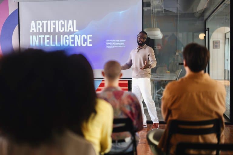 Group of professionals discussing AI at a seminar